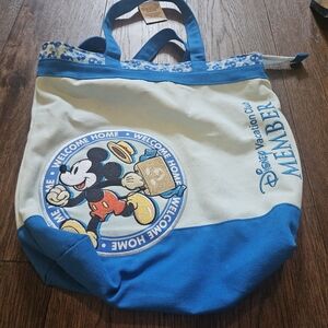 Disney Vacation Club Member Mickey Mouse Welcome Home - Blue Canvas Tote Bag.